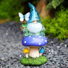 Starryfill Solar Garden Gnome Figurine in Blue Hat Plays with Butterfly on The Mushroom, 9.45inch(H) Resin Gnomes Decor with Solar Led Lights for Home Patio Lawn Backyard Christmas Decorations
