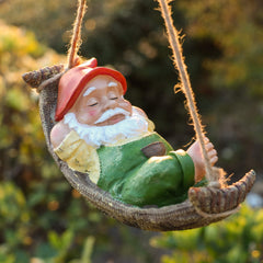 TERESA'S COLLECTIONS Cute Garden Gnomes Decorations for Yard Hanging Statues Outdoor Gifts, Sleepy Gnome in Swing Leaf Hammock Resin Tree Ornaments Figurines for Stump Branch Lawn Patio Decor, 7.4"